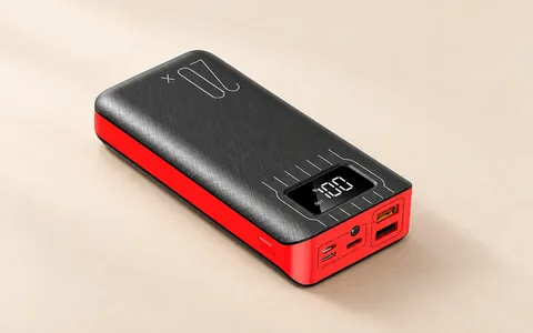 A black and red portable power bank with a charge display