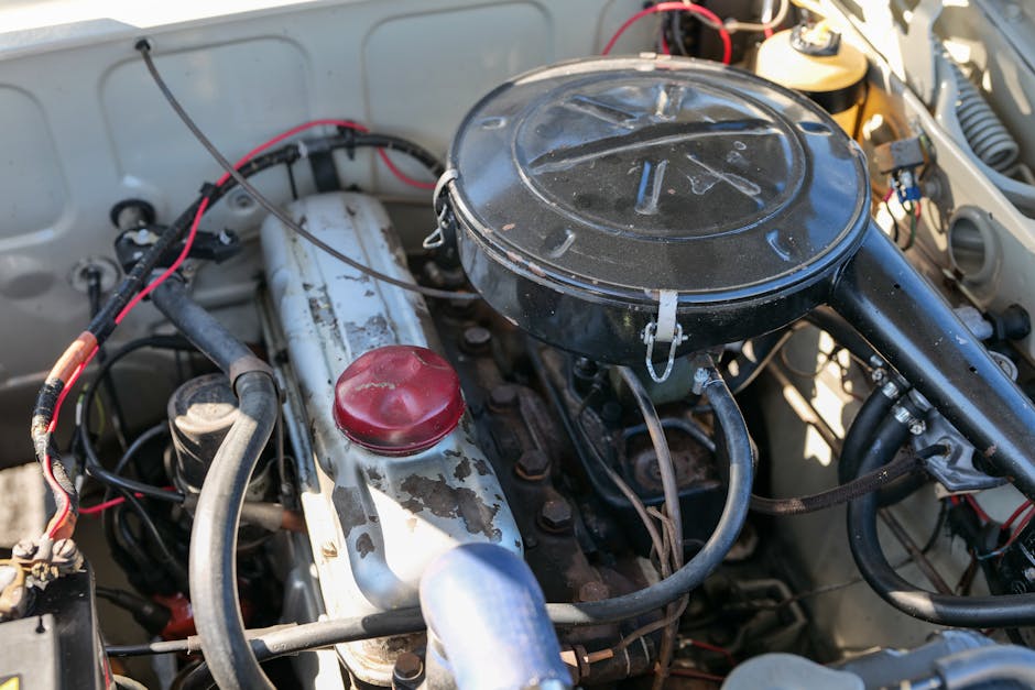A close up of the engine compartment of a car