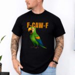 Man wearing black T-shirt with colorful parrot graphic and F-CAW-F text