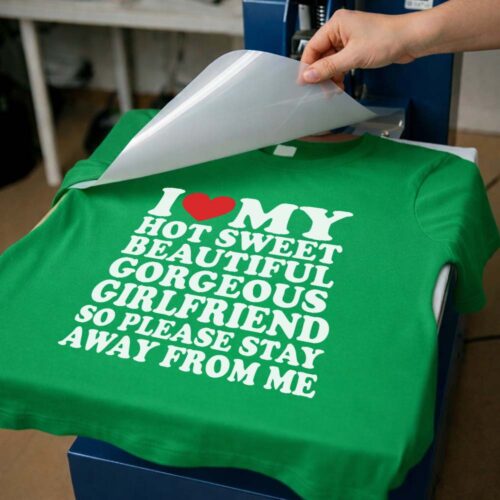 Green color I Love My Hot Sweet Girlfriend - DTF Transfer being printed T- Shirt