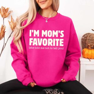 Women Wearing “I’m Mom’s Favorite” DTF Transfer crewneck sweatshirt