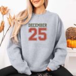 Women Wearing Retro Christmas DECEMBER 25 - DTF Transfer Grey Color crewneck sweatshirt