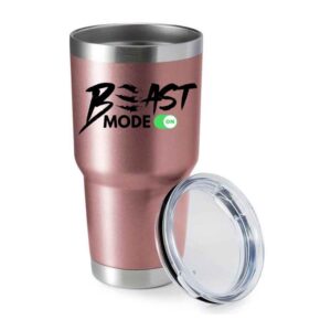 Rose gold insulated tumbler featuring "BEAST MODE ON" text and a clear lid.